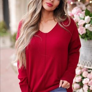 Red sweater. Never worn. Taking offers. Need gone ASAP